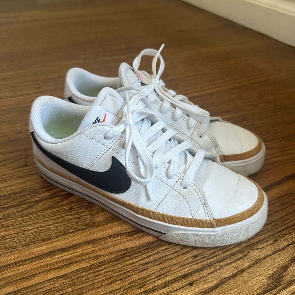 Nike White Sneakers with Black Swoosh and Tan Accent